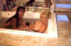 interracial lesbians having sex in the bathroom tub